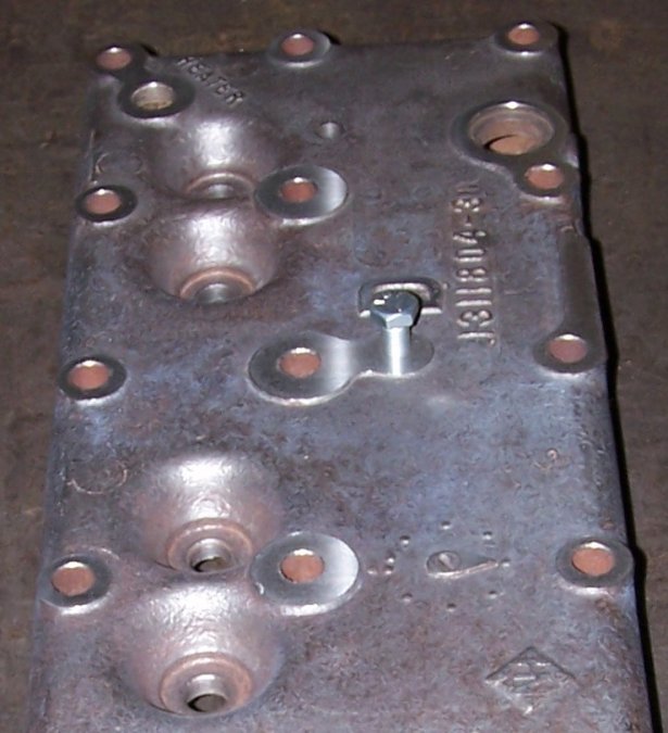 1857717760_Mysterycylinderhead2c.JPG.926ebd7dc46c35c61864b23f46699ad5.JPG